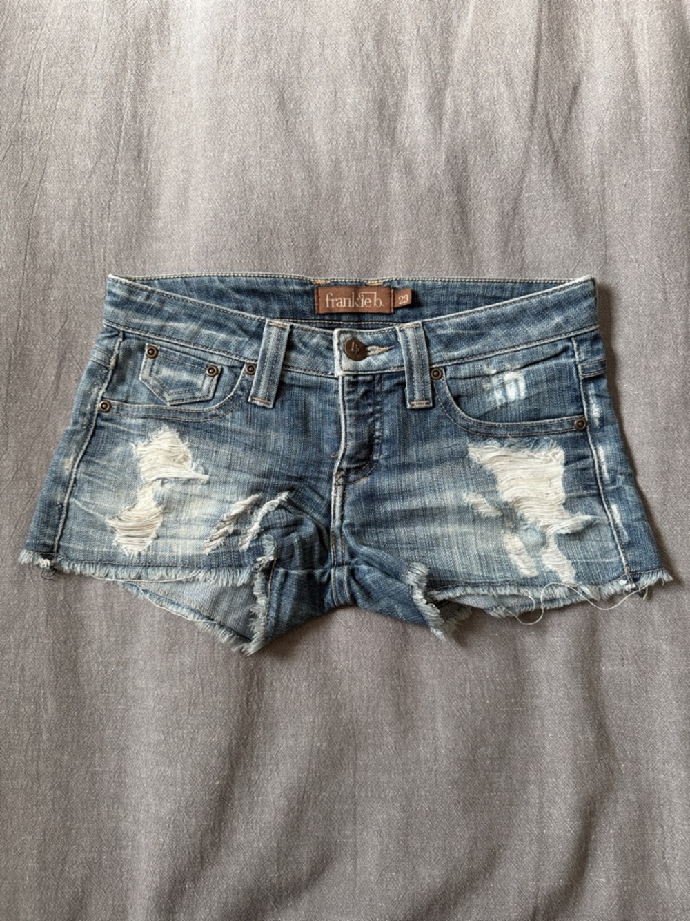 Frankie B. Light Blue Distressed Denim Cutoff Shorts